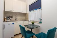 Kuchyňa alebo kuchynka v ubytovaní Apartments Villa Chiara Opatija