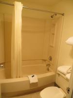 a bathroom with a tub and a toilet and a shower at Bryce View Lodge Part of the Ruby's Inn Resort in Bryce Canyon