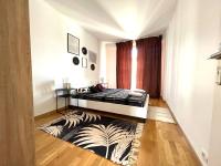 Cama o camas de una habitaci&oacute;n en Superbe appartement en centre-ville, 20min de Paris, 5 min d&#39;Enghien