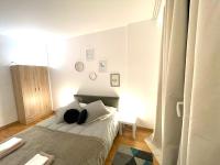 Cama o camas de una habitaci&oacute;n en Superbe appartement en centre-ville, 20min de Paris, 5 min d&#39;Enghien