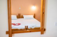 Posteľ alebo postele v izbe v ubytovaní Achillion Apartments & Studios