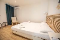 Łóżko lub łóżka w pokoju w obiekcie Montgolfiere Apartment by Connexion