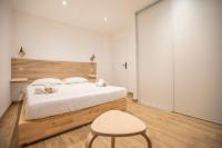 Łóżko lub łóżka w pokoju w obiekcie Montgolfiere Apartment by Connexion