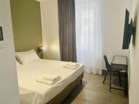 Posteľ alebo postele v izbe v ubytovaní Smart Rooms Naples