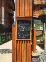 Et logo, certifikat, skilt eller en pris der bliver vist frem på Apartmán Mountain View - Tatragolf C