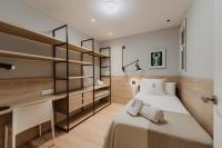 Posteľ alebo postele v izbe v ubytovaní Petit Luxe Volta Apartaments