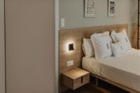 Posteľ alebo postele v izbe v ubytovaní Petit Luxe Volta Apartaments
