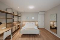 Posteľ alebo postele v izbe v ubytovaní Petit Luxe Volta Apartaments