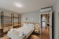 Posteľ alebo postele v izbe v ubytovaní Petit Luxe Volta Apartaments