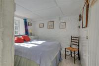 Postel nebo postele na pokoji v ubytování St Gabriels Cottage