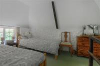 Postel nebo postele na pokoji v ubytování St Gabriels Cottage
