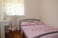 Posteľ alebo postele v izbe v ubytovaní Macadamia apartment with garage parking