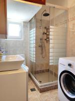 A bathroom at Sea Breeze Apartment