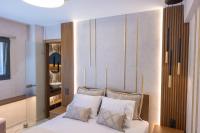 Posteľ alebo postele v izbe v ubytovaní Adell Miramare Golden Loft