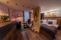 Postel nebo postele na pokoji v ubytování Ars Cracovia Apartments