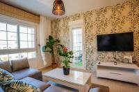 TV a/nebo společenská místnost v ubytování Apartament Pepillo's Beach,Wifi Pool Terrace