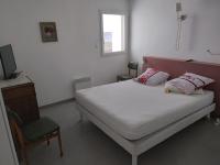 Posteľ alebo postele v izbe v ubytovaní Appartement F3 en bordure de l étang de thau