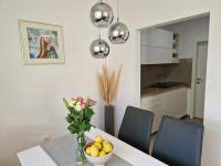 Kuchyňa alebo kuchynka v ubytovaní Apartman Adara
