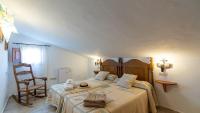Posteľ alebo postele v izbe v ubytovaní Villa Fuente Luz Frigiliana by Ruralidays