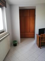A television and/or entertainment centre at Bed and Breakfast "POGGIO MARANO"