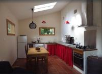 Kuchyňa alebo kuchynka v ubytovaní petite maison dans les pins