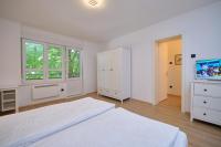 Posteľ alebo postele v izbe v ubytovaní Bacci Central 2-Bedroom Apartment by Litto