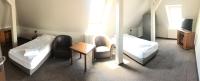 Postel nebo postele na pokoji v ubytování Hotel Krystyna