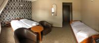 Postel nebo postele na pokoji v ubytování Hotel Krystyna