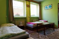 Posteľ alebo postele v izbe v ubytovaní Tatry Liptov