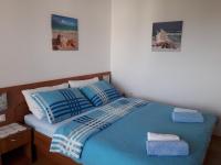 Postel nebo postele na pokoji v ubytování Apartmani Braut