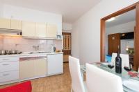 Kuchyň nebo kuchyňský kout v ubytování Apartmani Braut