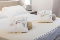 Posteľ alebo postele v izbe v ubytovaní Hotel L'Approdo