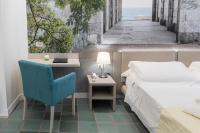Posteľ alebo postele v izbe v ubytovaní Hotel L'Approdo
