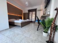 Posteľ alebo postele v izbe v ubytovaní Amarylis Beachfront Studios