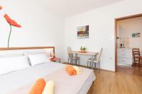 Postel nebo postele na pokoji v ubytování Apartmani Braut