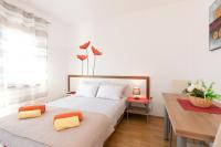 Postel nebo postele na pokoji v ubytování Apartmani Braut