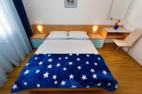Postel nebo postele na pokoji v ubytování Apartmani Braut