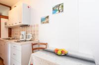 Kuchyň nebo kuchyňský kout v ubytování Apartmani Braut