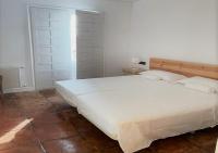 Posteľ alebo postele v izbe v ubytovaní Hotel los Tilos