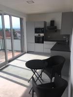 Kuchnia lub aneks kuchenny w obiekcie Apartment Sun Lakes - Sever