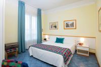 Posteľ alebo postele v izbe v ubytovaní Hotel L'Approdo