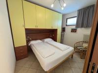 A bed or beds in a room at Albergo San Remo
