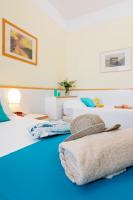 Posteľ alebo postele v izbe v ubytovaní Hotel L'Approdo