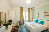 Posteľ alebo postele v izbe v ubytovaní Hotel L'Approdo