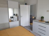 Kuchyňa alebo kuchynka v ubytovaní Juventus Apartman