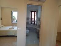 A bed or beds in a room at Vittorio Veneto Accomodation - Tropea city center