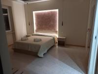 A bed or beds in a room at Vittorio Veneto Accomodation - Tropea city center