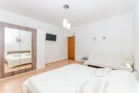 Postel nebo postele na pokoji v ubytování Apartments Bee Maja