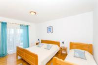 Postel nebo postele na pokoji v ubytování Apartments Bee Maja
