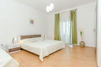 Postel nebo postele na pokoji v ubytování Apartments Bee Maja